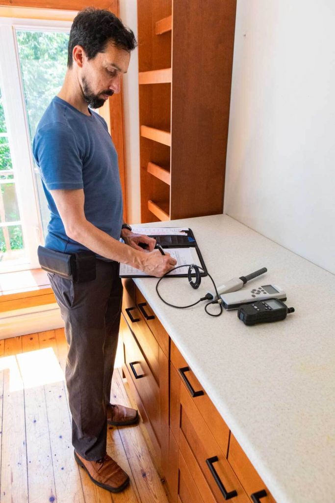home inspector testing indoor air quality